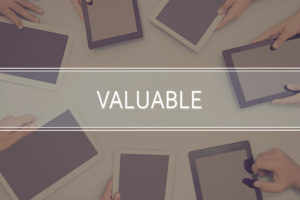 VALUABLE CONCEPT Business Concept - circle of tablets with "Valuable" in middle